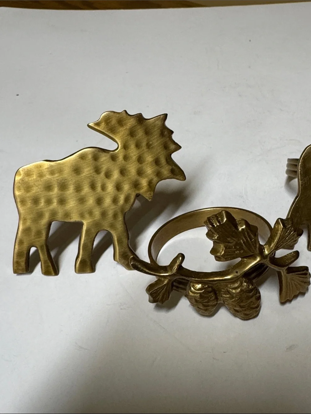 brass moose and pinecone and branch napkin rings set of 4